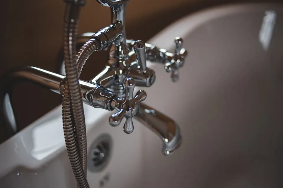 Plumbing services in Deira — tap, leak and bathroom repairs by Top Fixers